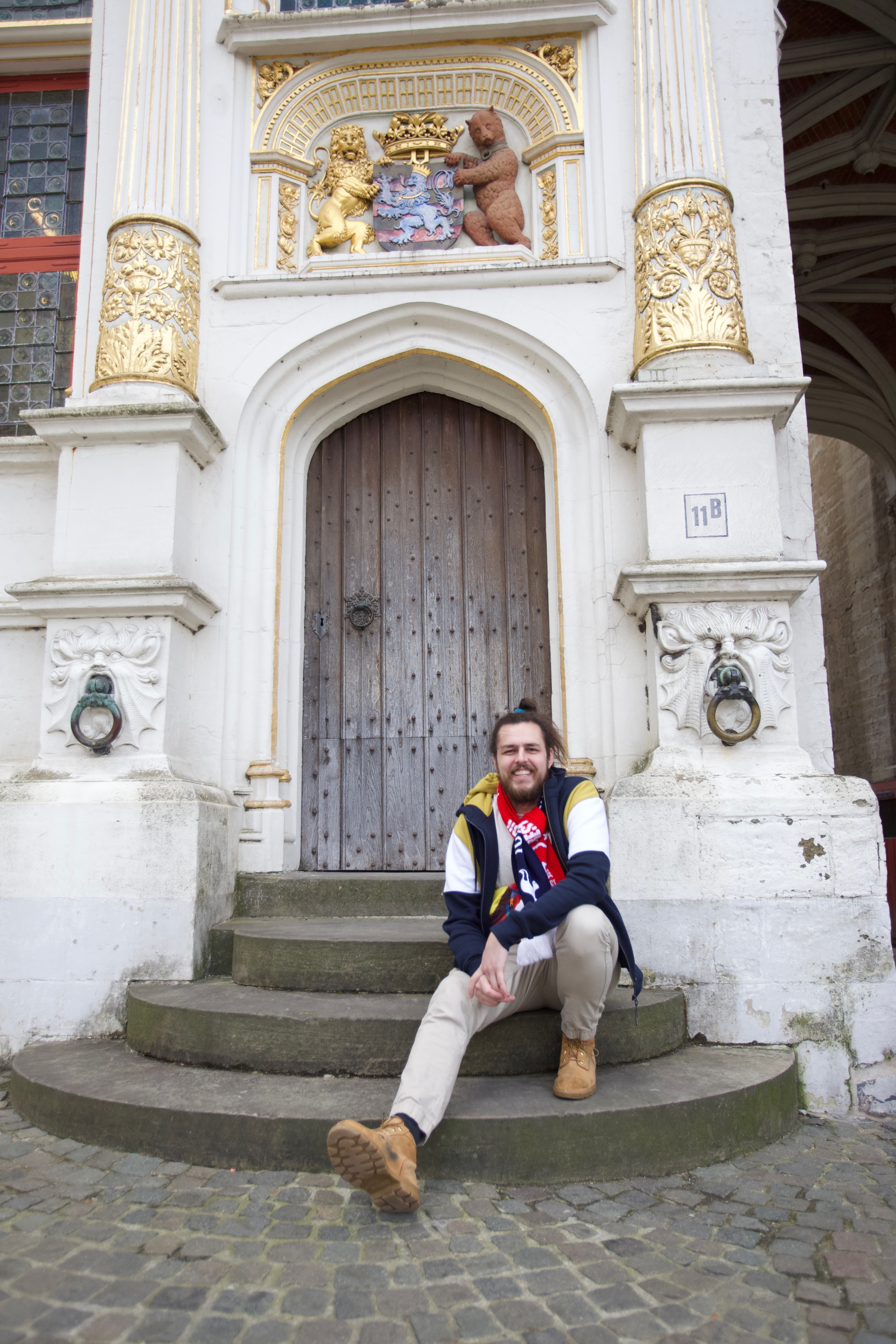Danny Cowser on a cobblestone street while traveling in Europe